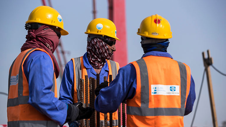 Bilde av arbeidsfolk. 